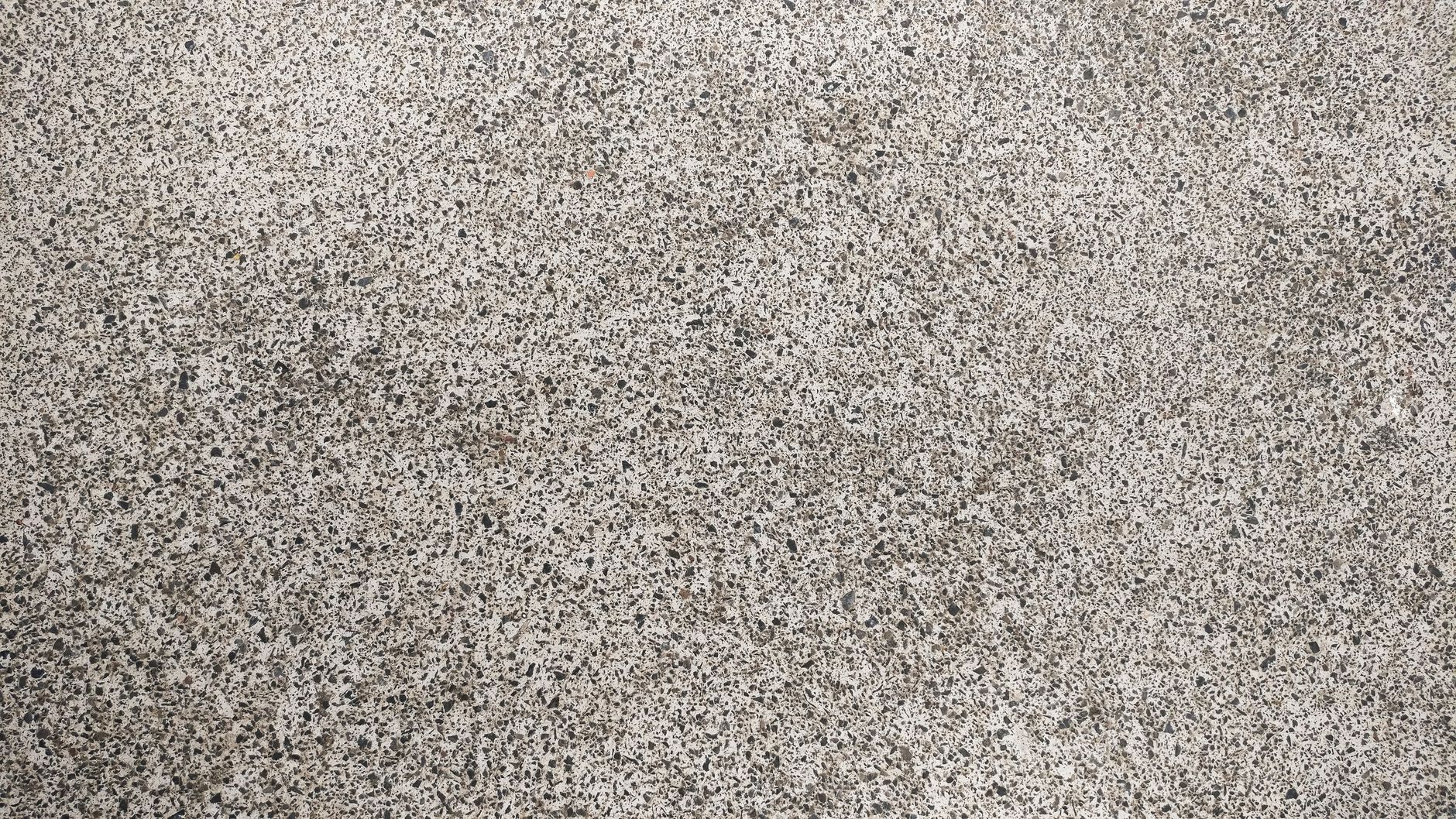 High-resolution image of a textured concrete surface, perfect for design backgrounds in Carlsbad, CA
